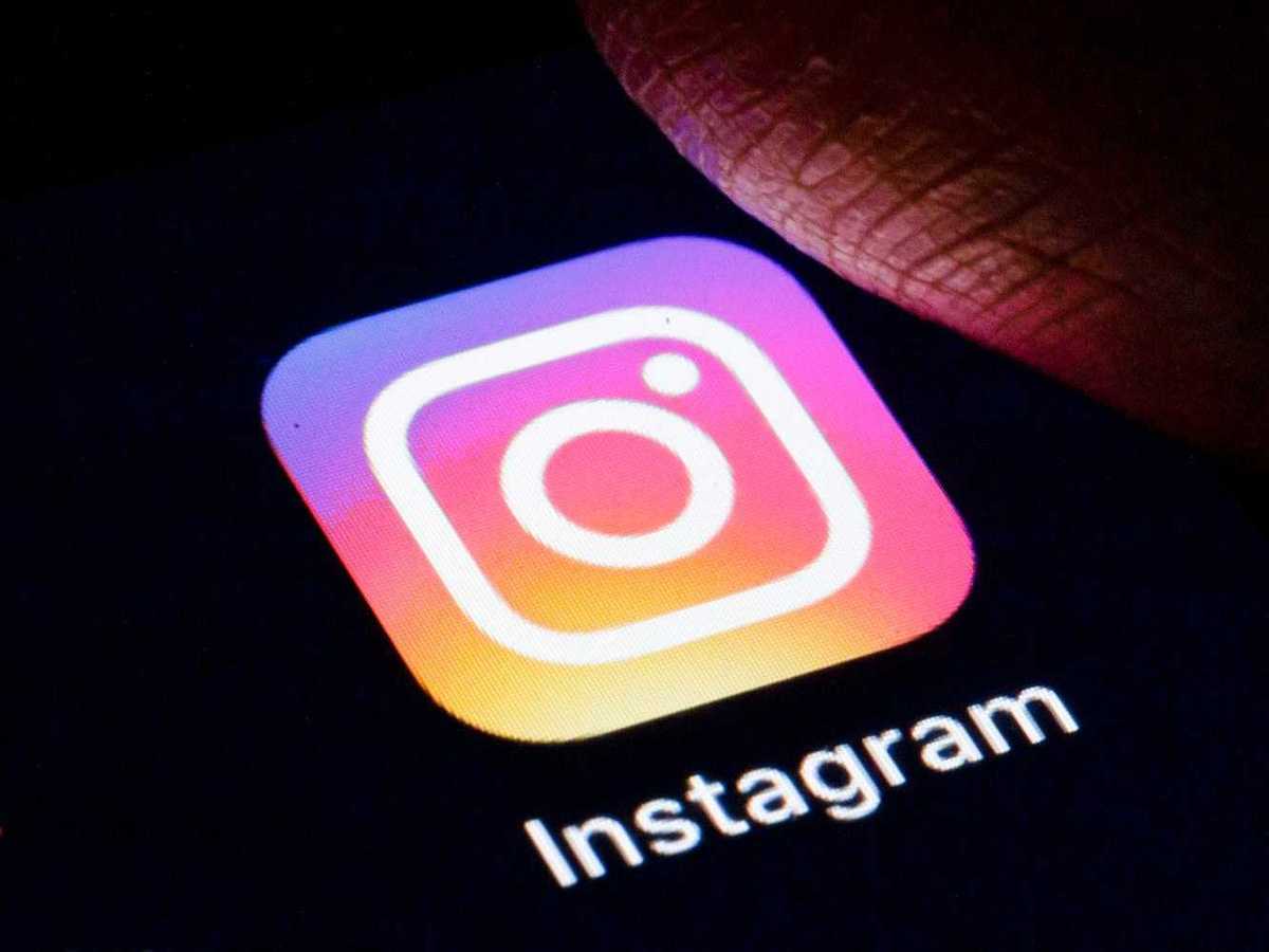 Instagram App Being Pressed by Thumb